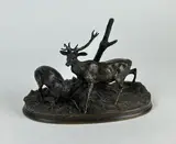 Cerf et biche près d'un tronc d'arbre by Pierre-Jules Mêne, Bronze, patine brune, sold Nov 2024