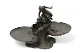 Sans titre by Auguste Ledru, Bronze à patine brune présentant une double vasque et une femme au centre, sold Nov 2024