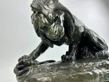 Lion attaquant un serpent by Antoine-Louis Barye, Bronze, patine verte, fonte du XIXe siècle, sold Nov 2024