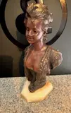 Buste de jeune femme au bandeau by Van der Straeten, Bronze à patine mordorée, sold Oct 2024