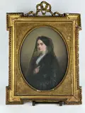 Portrait de femme en noir by Charles Louis Gratia, 1850, Pastel médaillon dans un cadre rectangulaire en bois doré du style Louis XVI, sold Sep 2024