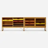 Cabinets, pair by Børge Mogensen, c. 1955, oak, glass, lacquered wood, enameled steel, sold Nov 2022