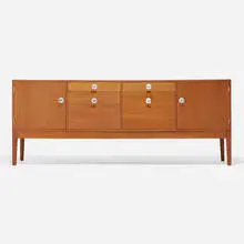 Cabinet by Finn Juhl, c. 1965, teak, chromium-plated steel, sold Nov 2022