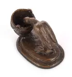 Duck feeding from a pail by Carlos Neto, bronze, sold Dec 2023