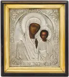 Russisch, um 1880 by Gottesmutter von Kasan mit Silberoklad in Kiyot, tempera, sold Jun 2023