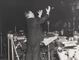 L.H. LaGuardia Conducting the Band of the Department of Sanitation by Nat Fein, Gelatin Silver Print, sold Oct 2024