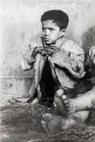 Seated Boy by Sergio Larraín, 1955, Gelatin Silver Print, sold Oct 2024