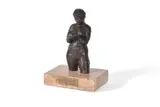 A bronze figure of 'girl looking at a fossil' by Karin Jonzen, BRONZE, sold Dec 2021