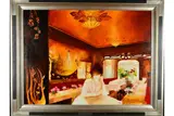 'La Dame De Chez Maxims', a woman sitting at a table in Maxims in by Joel Rougie, oil on canvas, sold Jan 2019