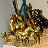 to include a ceramic Alsatian and Jack Russell, together with brass horses, a Bull, a Dog and a Fox etc by Eight Animal Sculptures, sculpture, sold Jan 2019