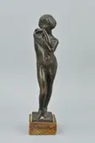 a bronzed sculpture of a nude woman, inscribed 'Erica Lee 1919', attached to a marble by Erica Lee, sculpture, sold Dec 2018