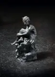An early 20th century bronze figure of Pan with his pipes, seated on a rocky outcrop by Violet Manners, Duchess of Rutland, bronze, sold Jan 2018