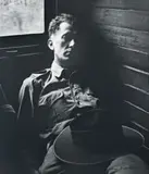 Tired Soldier In Queensland Train by Max Dupain, 1943, (printed 1970s) silver gelatin photograph, sold Nov 2007
