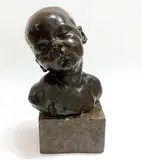 Buste d'enfant endormi by Jules Dalou, Bronze à patine brune nuancée, sold Jan 2020
