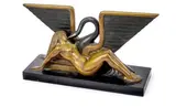 Léda et le cygne, circa 1930 by Marcel-André Bouraine, Epreuve en bronze à patine noire et médaille, sold Apr 2022