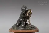 Enfant au chien et à la grenouille by Joseph d'Asté, Epreuve en bronze patiné signée sur la terrasse, sold Jul 2022