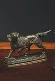 Chien à l'arrêt by Alfred Dubucand, Épreuve en bronze à patine brune, sold Dec 2024
