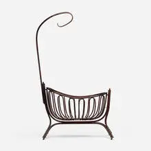 Cradle, model 12802 by Michael Thonet, c. 1904, bent and lacquered beech, brass, sold Oct 2022