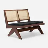 Settee from Chandigarh by Pierre Jeanneret, c. 1960, teak, cane, upholstery, sold Oct 2022