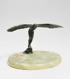 Untitled by Leon Salat, bronze figurine on green stone base, sold Sep 2020