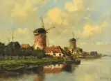 Dutch, windmills on a Dutch waterway with barges in the foreground by Jan Stork, oil on canvas, sold Nov 2023