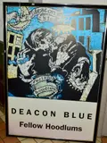 a promotional poster for the album released in 1991, depicting a woodcut image of a man and woman kissing, mounted and framed, approximate size 146cm x 100cm by Deacon Blue 'fellow Hoodlums', woodcut, sold Aug 2018