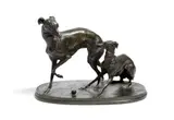 A 19th century bronze of two whippets at play with a ball, the oval base signed 'P by Pierre-Jules Mêne, bronze, sold Oct 2017