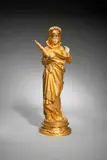 Le chant de la liseuse by Maurice Constant Favre, Épreuve en bronze doré patiné, sold Nov 2023
