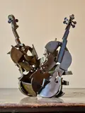 Colère de violon by Fernandez Arman, Épreuve en bronze de patine brune, sold Dec 2024