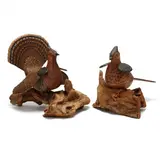 Pair of Folk Art Carved Grouse by Frank Warren, Carved and painted wood figures affixed to natural wood bases, sold Jul 2024