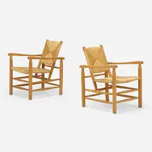 Armchairs, pair by Charlotte Perriand, c. 1947, ash, rush, sold Oct 2022