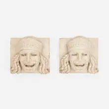 Comedy mascarons, pair by Neoclassical, glazed terracotta, sold Oct 2022