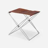 Folding stool by Jørgen Gammelgaard, 1970, chrome-plated steel, leather, sold Oct 2022