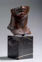 Portrait d'homme - 1984 by Igor Mitoraj, Bronze à patine brune, sold May 2019
