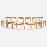 Cow Horn chairs, set of eight by Hans J. Wegner, 1952, oak, upholstery, sold Oct 2022