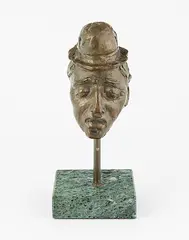 Männerkopf mit Hut by Andreff Raffaelli, 1959, bronze, sold Sep 2018