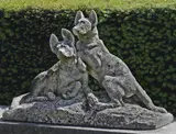 A sculpted limestone group of two dogs by Thomas François Cartier, sculpture, offered May 2021