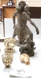 A clay head and three by Leslie Charlotte Benenson, bronze, sold Apr 2022