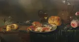Still life of crabs, fruit, a loaf of bread, rummer, flagon and flowers upon a table top oil on wooden panel signed and dated 1646 40 x 70cm by Alexandre Adriaensen, 1646, oil on wood, sold Mar 2022