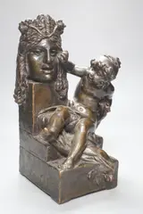 A bronzed terracotta group of putto beside a classical mask by Joseph Gustave Chéret, sculpture, sold Jan 2022