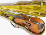 no labels to the interior, 58cms long, together with a similar period crocodile case, and a canvas outercase by Th Century Violin, oil, sold Mar 2020