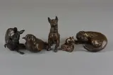 a bronze sculpture of an Otter, approximately 9cm in length, a bronze by Paul Jenkins, bronze, sold Apr 2018