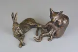 a bronzed artist proof sculpture of a Hare lying down, inscribed signature by Paul Jenkins, bronze, sold Apr 2018