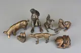 a bronze sculpture of a Hare on its hind quarters, together with six other by Peter Jenkins, bronze, sold Apr 2018