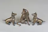 Greyhound' seated bronze sculpture with incised initials, together with two 'Jack Russell' seated bronze sculptures, both initialled (3) by Robert Crutchley, bronze, sold Apr 2018
