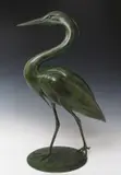 Heron standing on a circular base by Geoffrey Dashwood, bronze, sold Jun 2017