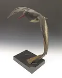 Oyster Catcher in flight Signed with initials, dated 2000 and numbered 2/12 Cold painted bronze sculpture on a granite base 51cm high by Hamish Mackie, 2000, bronze, sold Jun 2017