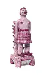A tin glazed pottery figure, of a winged female wearing a skirt attached to a tree, the base inscribed 'HN 28.6.99 by Hylton Nel, sculpture, sold Jan 2017