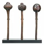 A Group Of Three Fijian Throwing Clubs (Ula) by Oceanic Artefacts, two with finely carved heads, one with bulbous rootstock head, all with incised pattern to hand grip, old patina, sold Oct 2009