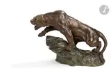 Tigre au rocher by Thomas François Cartier, Épreuve en bronze à patine mordorée et verte, sold Dec 2023